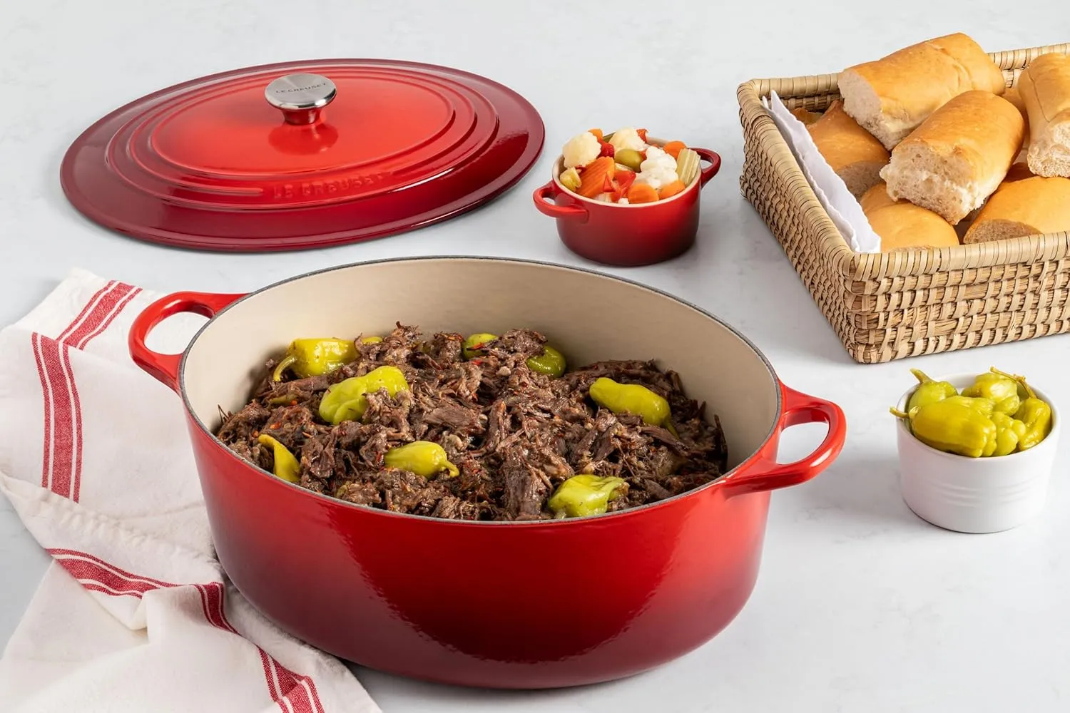 Le Creuset Enameled Cast Iron Signature Oval Dutch Oven, 8 qt., Cerise